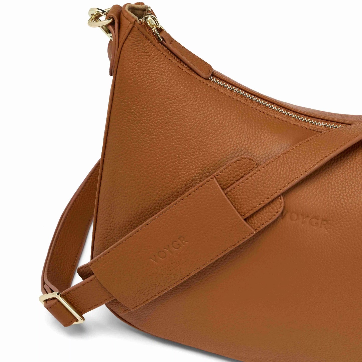 Brown leather camera with visible Voygr logo on a white background