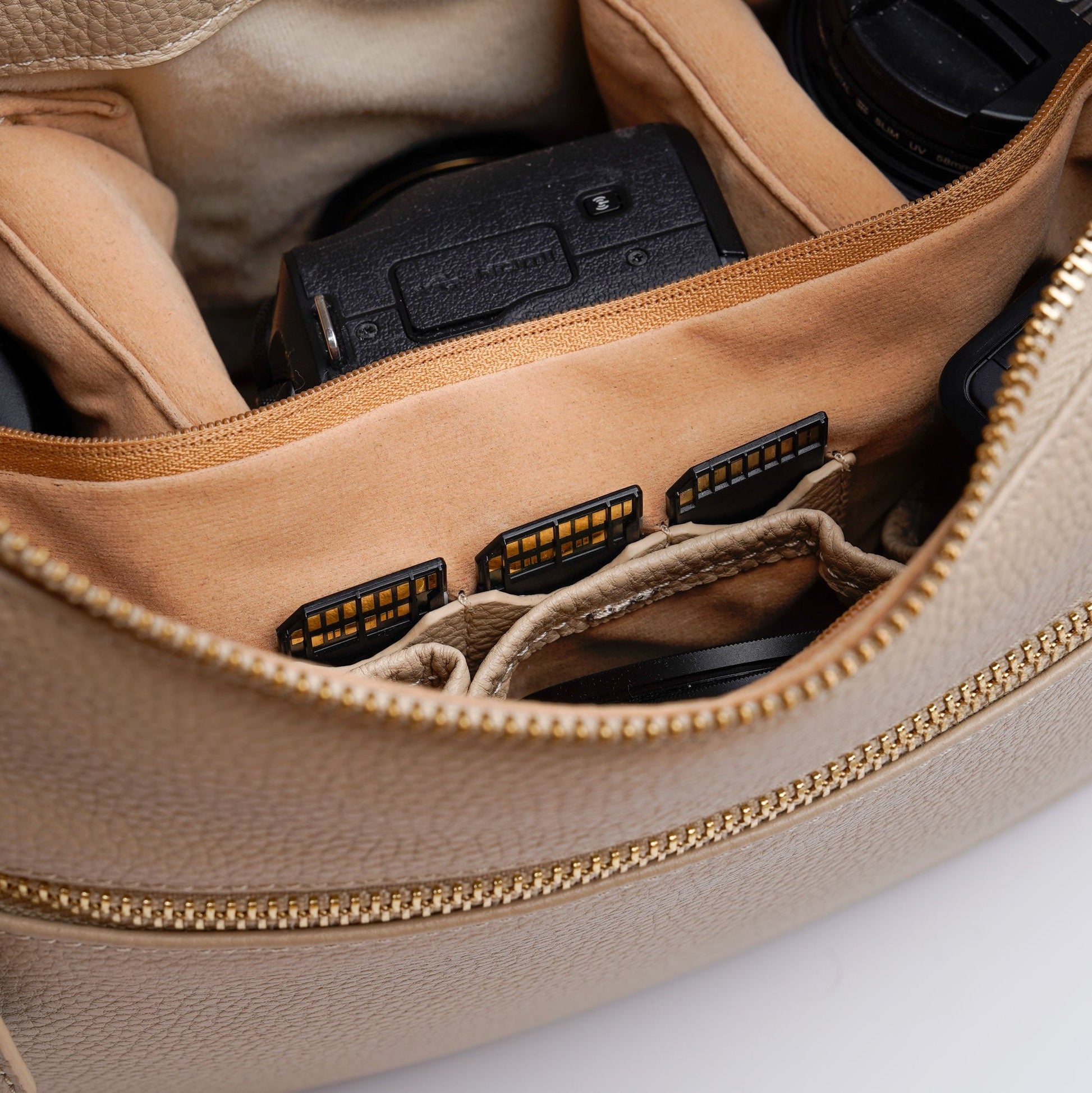 Close up of Dividers and Memory Card Storage for VOYGR Essential Bag in Beige