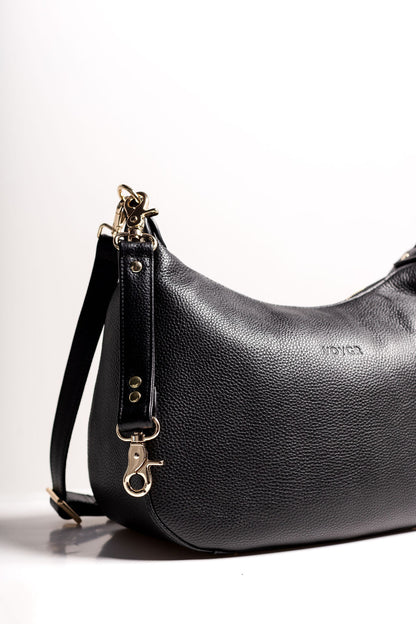 Side view of Voygr Essential Camera Bag with Leather Camera Strap